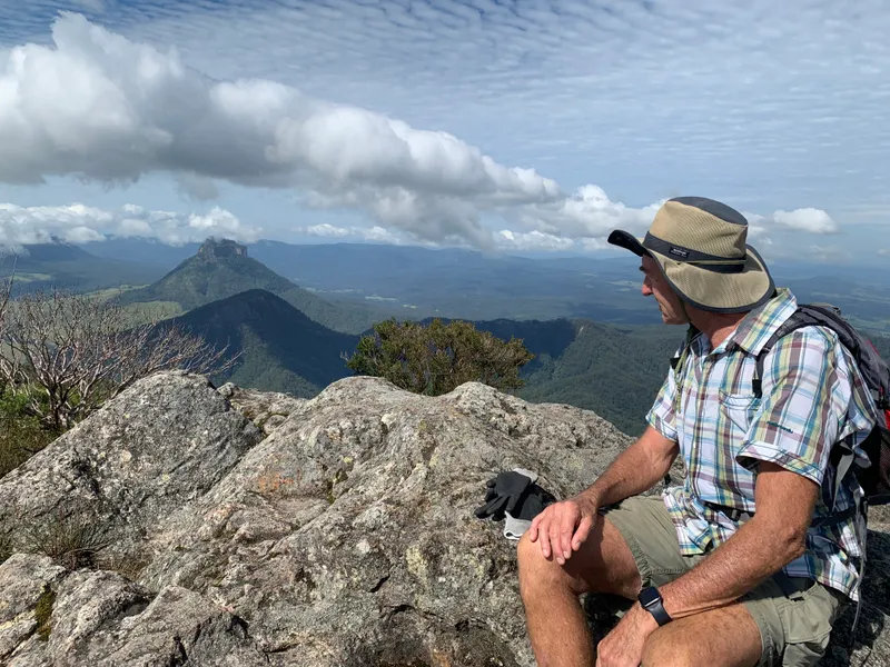Dad looks out at Mt Lindesay from the East Peak of Mt Barney.